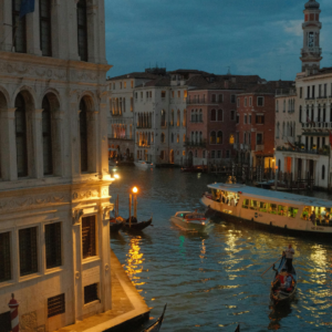 Venice canal at night with illuminated historic buildings
